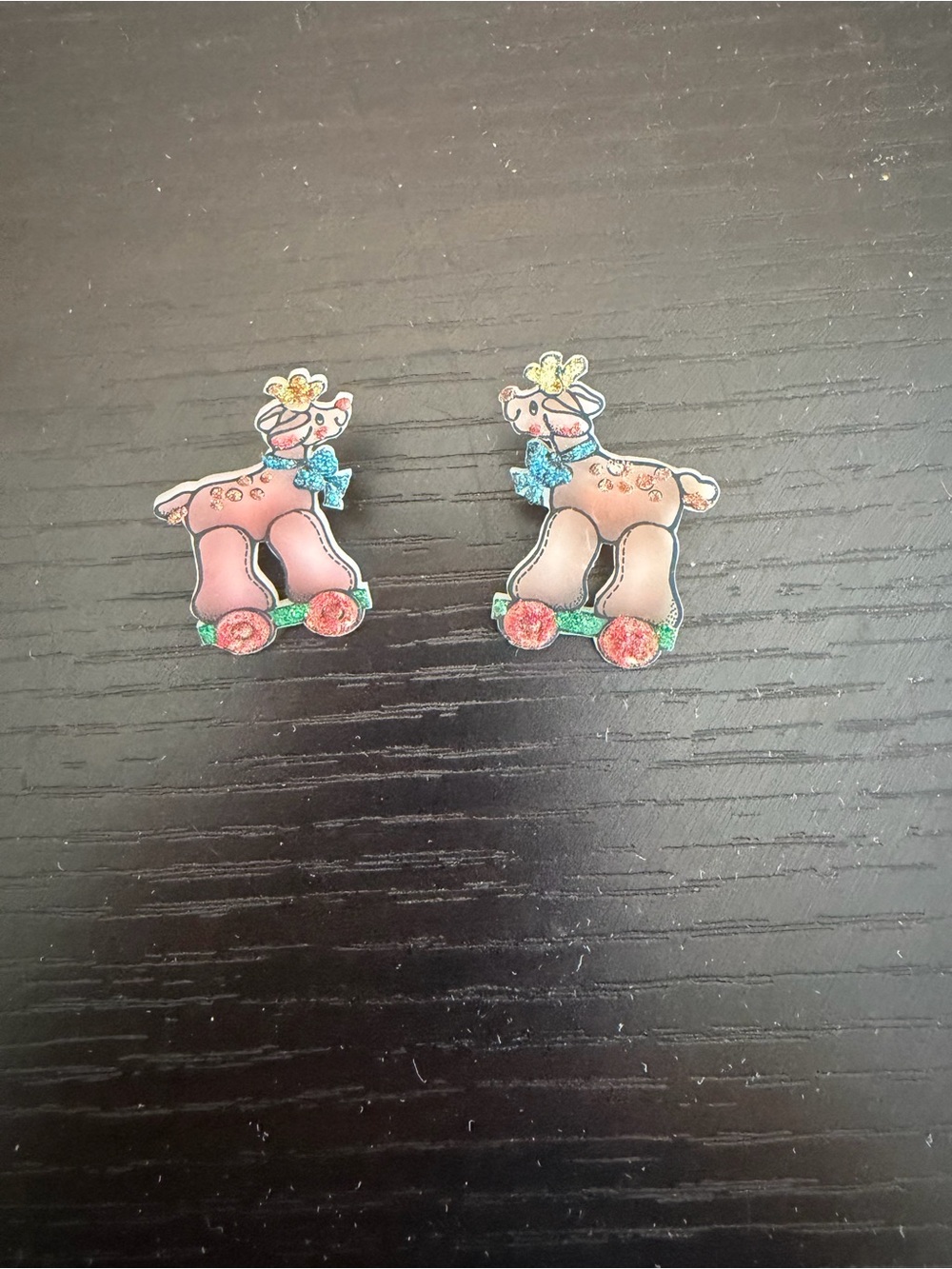 Stud earrings featuring a vintage-style reindeer